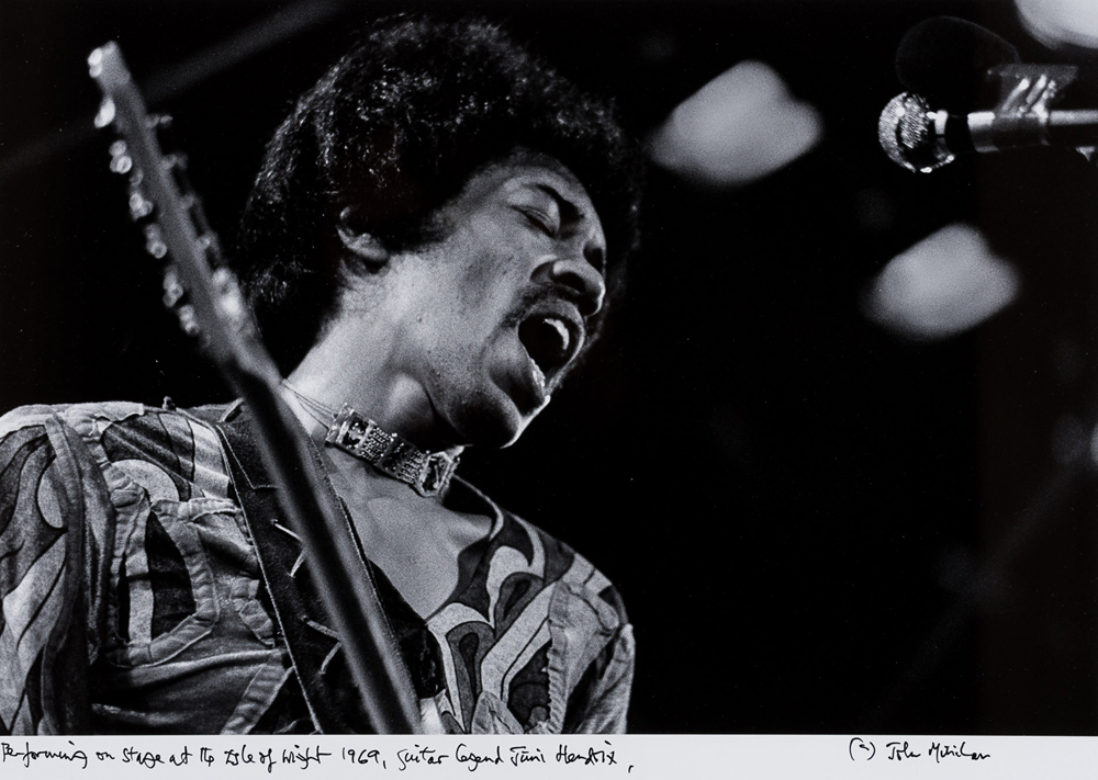 Minihan, John. (b.1946) Jimi Hendrix - Performing on stage at the Isle of Wight, 1969. at Whyte's Auctions