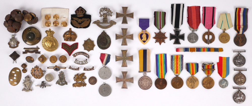 A collection of military medals, badges and buttons. at Whyte's Auctions