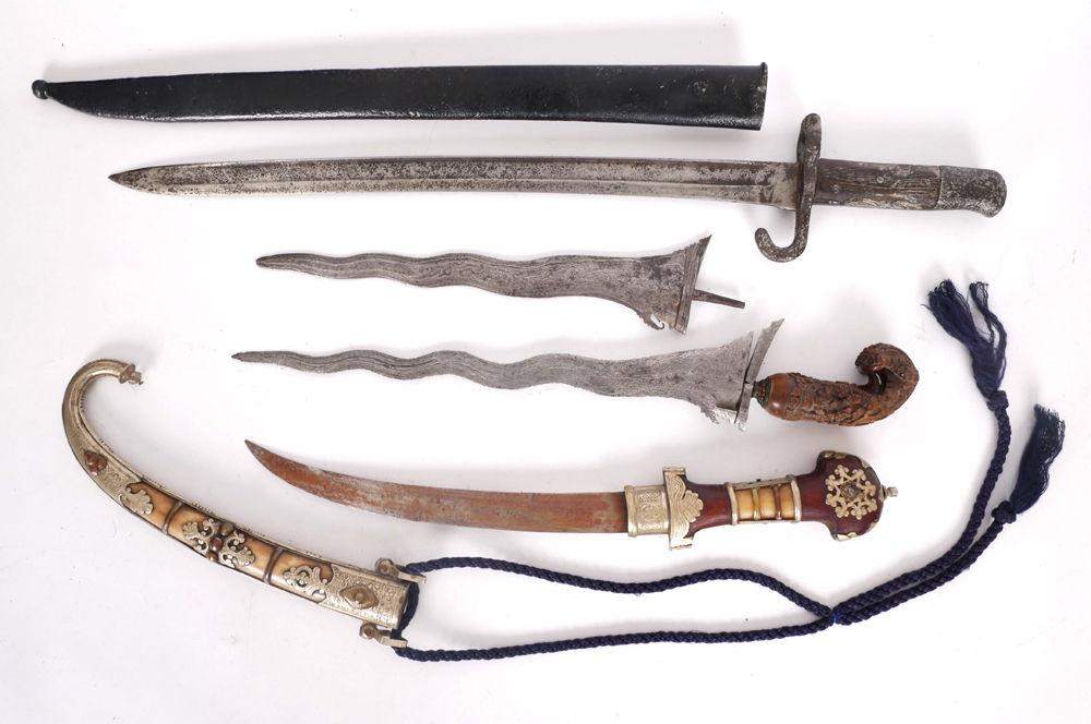 A Malayan Kris, a kris blade, an Indian dagger and a bayonet. at Whyte's Auctions