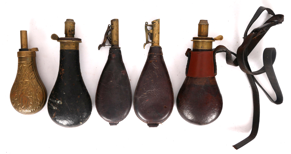 Collection of gunpowder flasks. at Whyte's Auctions