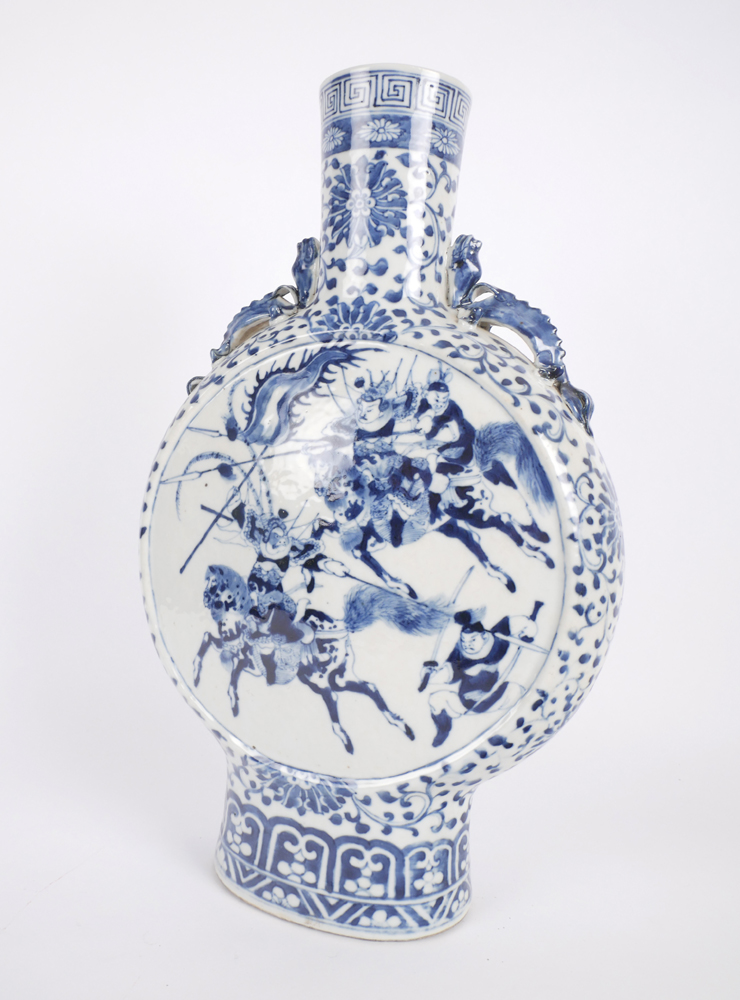 A 19th century Oriental blue and white porcelain moon flask. at Whyte's Auctions