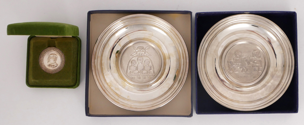 A pair of 20th century Irish silver circular waiters and a medal by Douglas Bennett. at Whyte's Auctions