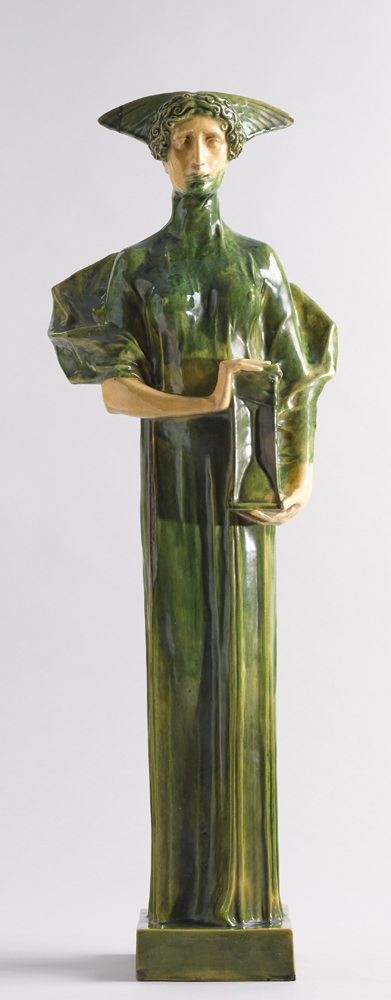 FEMALE FIGURE HOLDING AN HOURGLASS by Michael Powolny (Austrian, 1871-1954) at Whyte's Auctions