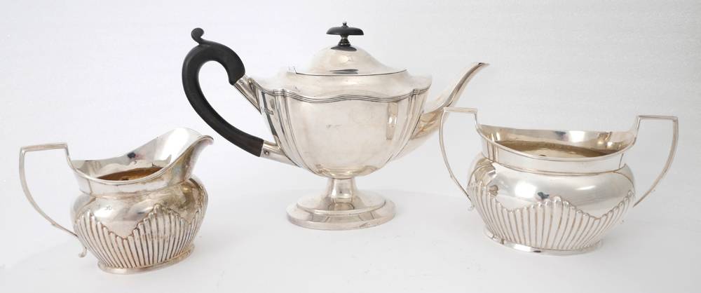 Silver teapot, sugar bowl and milk jug. at Whyte's Auctions