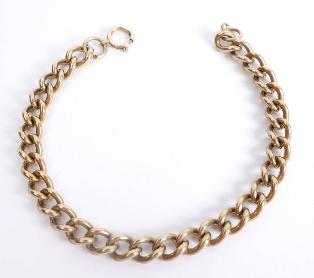 Gold curb chain bracelet. at Whyte's Auctions