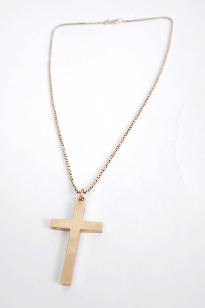 Gold cross on chain. at Whyte's Auctions