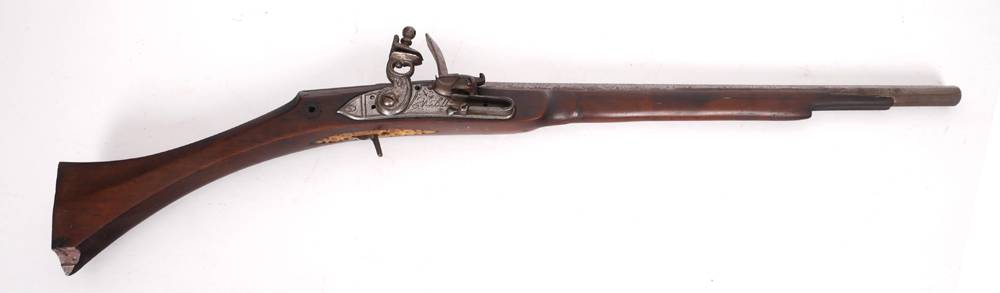 A Middle-Eastern flintlock carbine. at Whyte's Auctions