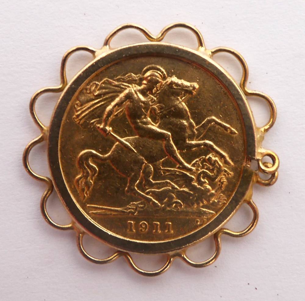 George V gold sovereign,1911, in 9 carat gold pendant mount. at Whyte's Auctions