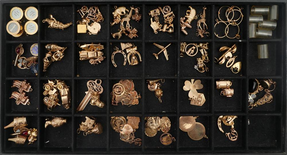 115 gold charms at Whyte's Auctions