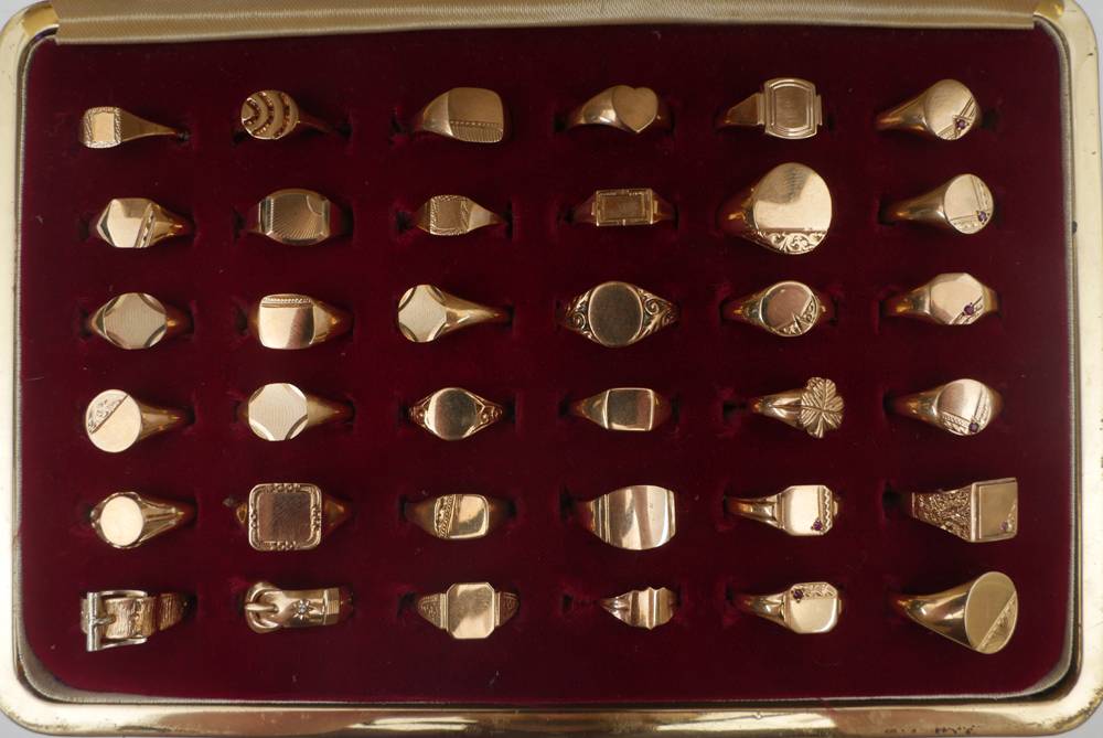 36 gold signet rings. at Whyte's Auctions