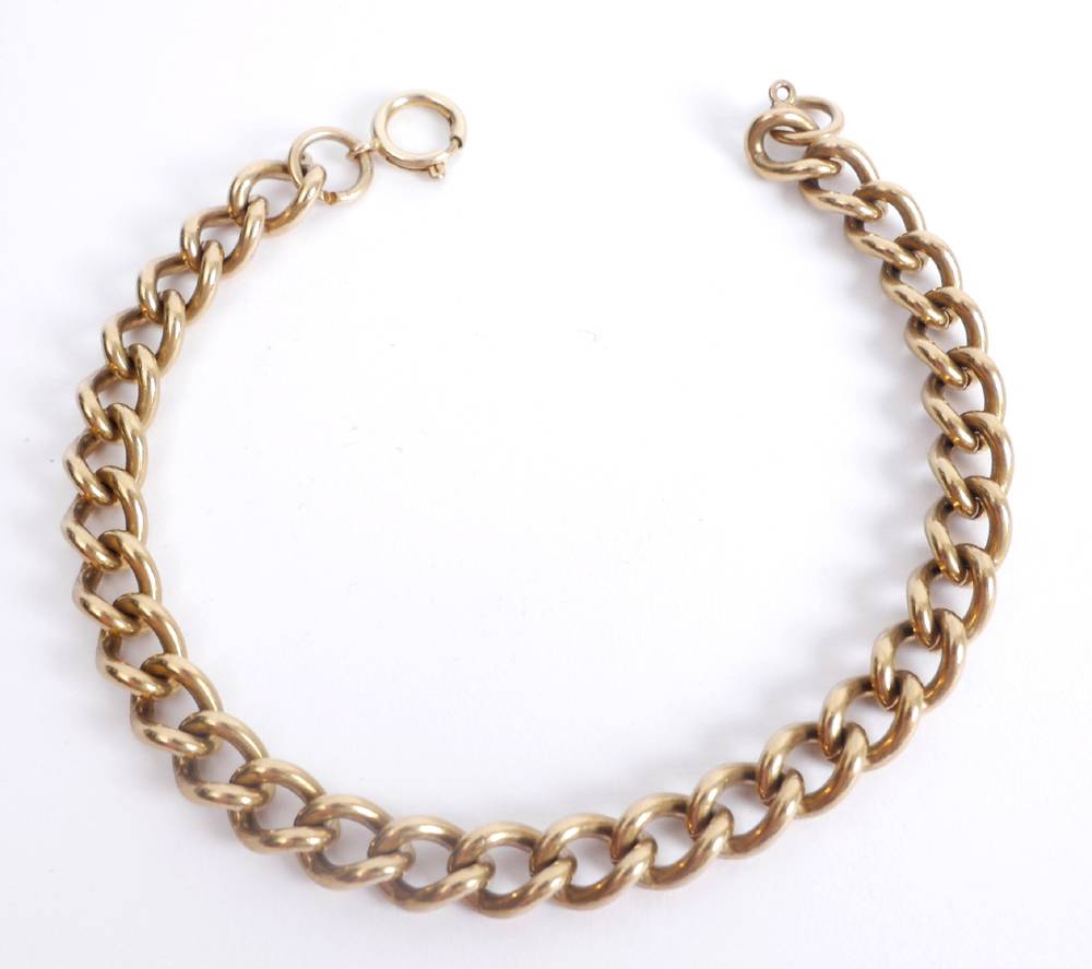 Gold curb chain bracelet and two gold brooches. at Whyte's Auctions