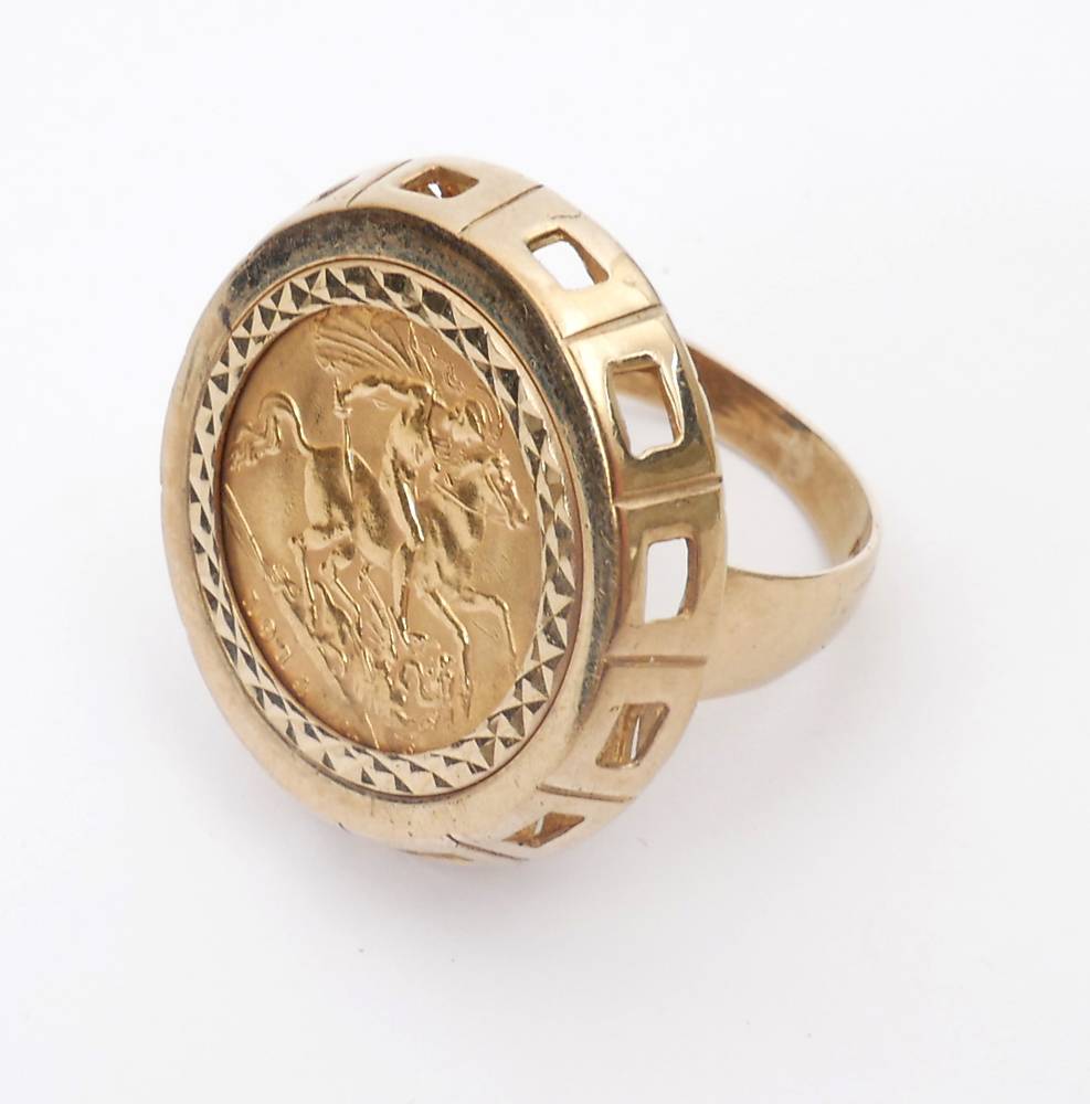 George V gold sovereign, 1914, mounted in 9ct gold ring. at Whyte's Auctions