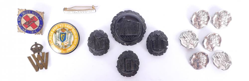 A collection bog oak, silver and enamel buttons and badges. at Whyte's Auctions