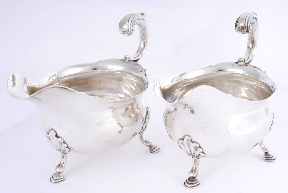 A pair of George II silver sauceboats with Powerscourt crest, by David Hennell. at Whyte's Auctions