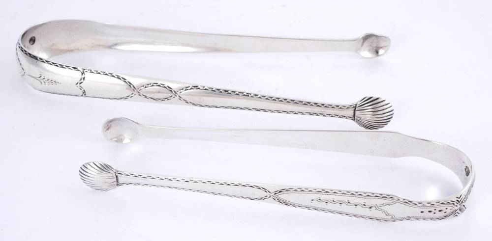 Two George III Irish silver sugar tongs, by Benjamin Tait. at Whyte's Auctions