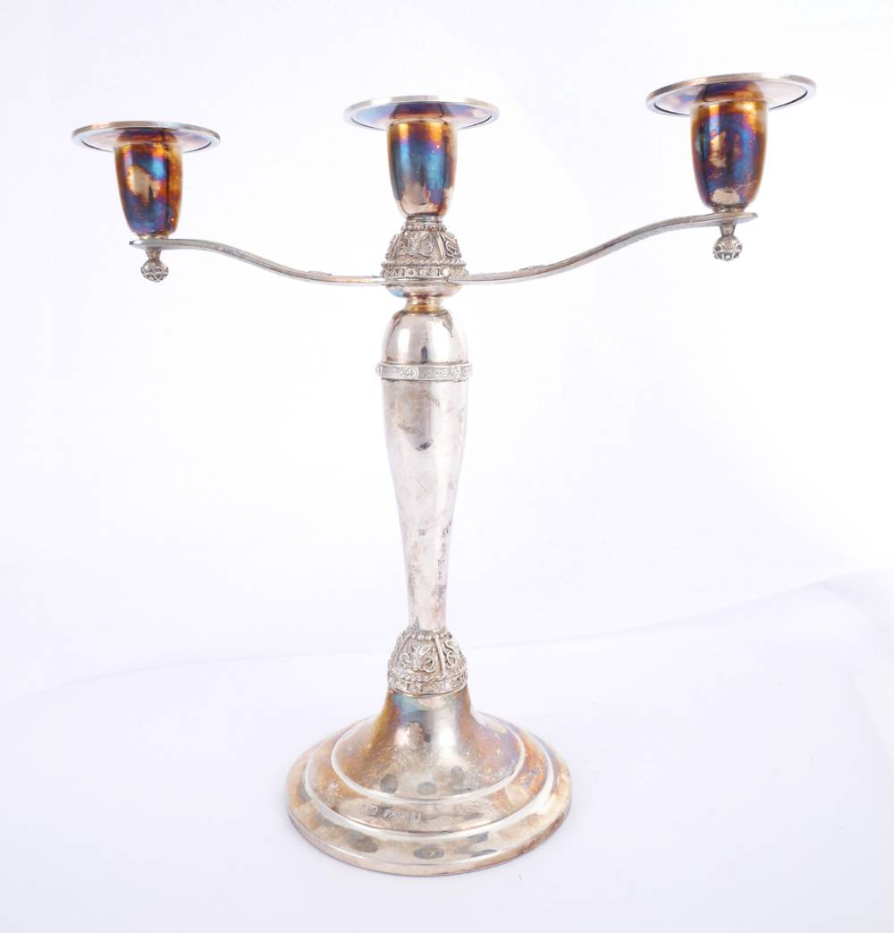 A late 20th century Irish silver candelabrum. at Whyte's Auctions