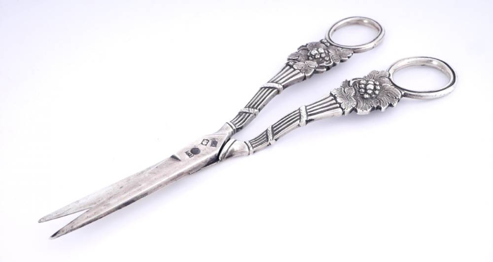 A pair of George III Irish silver grape scissors. at Whyte's Auctions