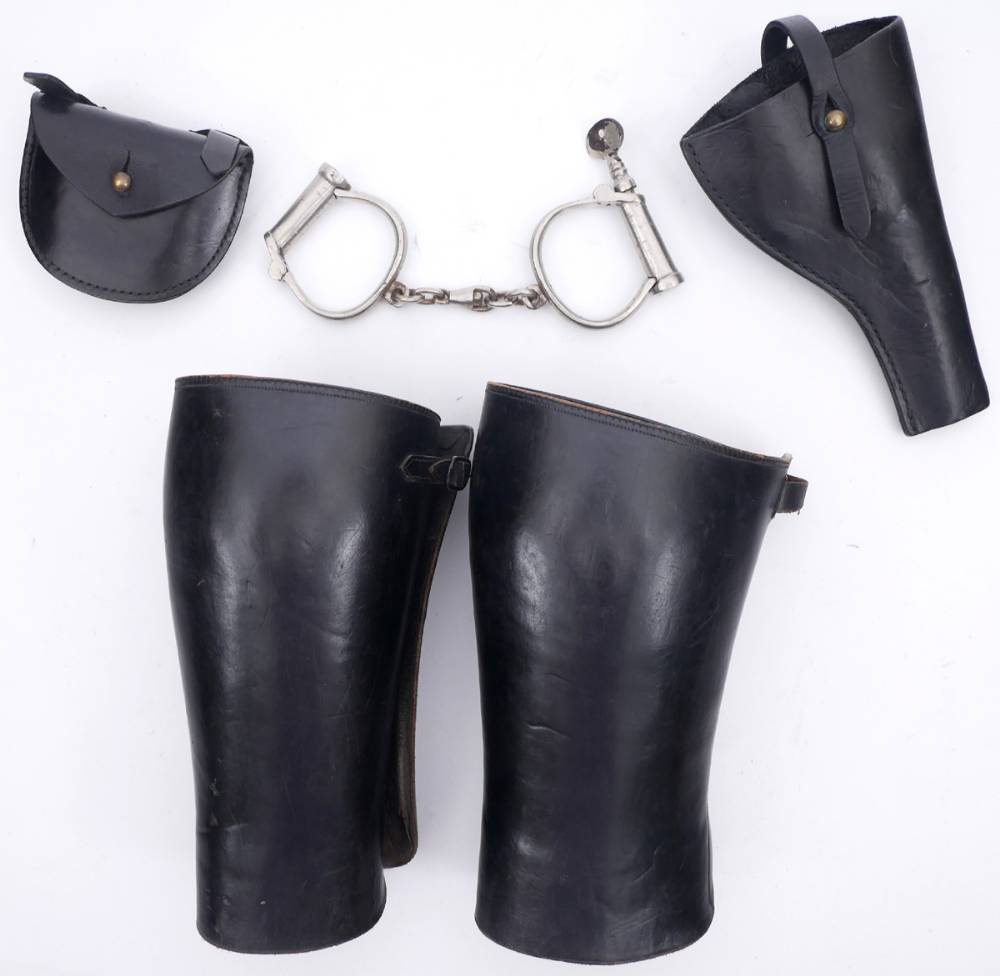 Royal Irish Constabulary gaiters, holster, pouch and handcuffs. at Whyte's Auctions