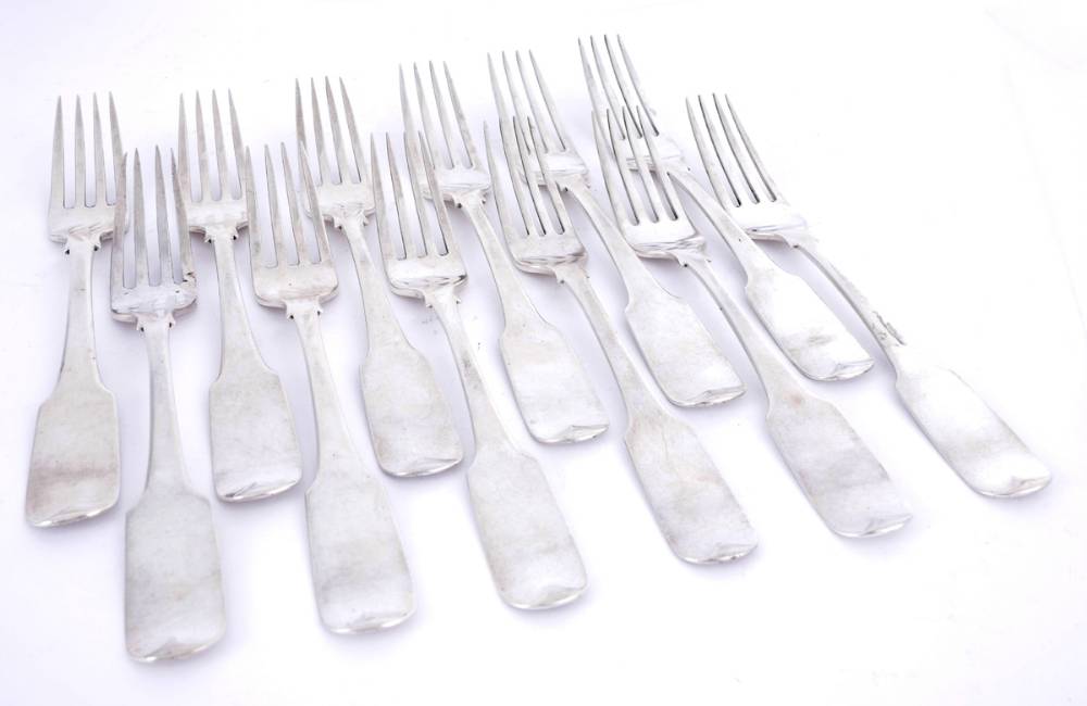 A set of twelve George III Irish silver fiddle pattern dessert forks by Tudor and Whitford. at Whyte's Auctions