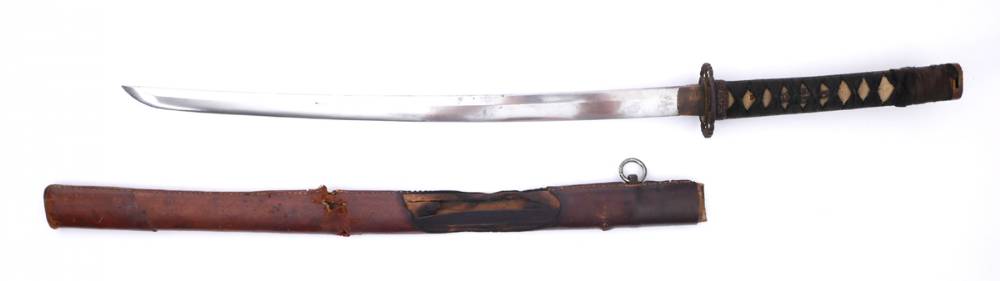Japanese Wakizashi, traditionally made blade in WWII Gunto mounts, with bullet strike to scabbard. at Whyte's Auctions