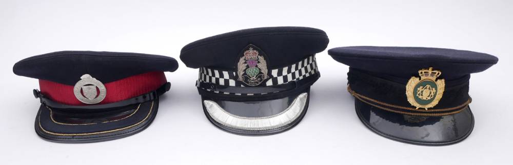 Three Police Officers' uniform hats. at Whyte's Auctions