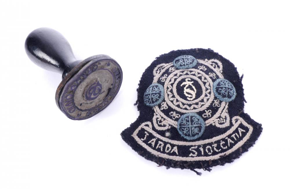1922-1950 Garda Sochna, Inspector's cuff rank badge and a station handstamp. at Whyte's Auctions