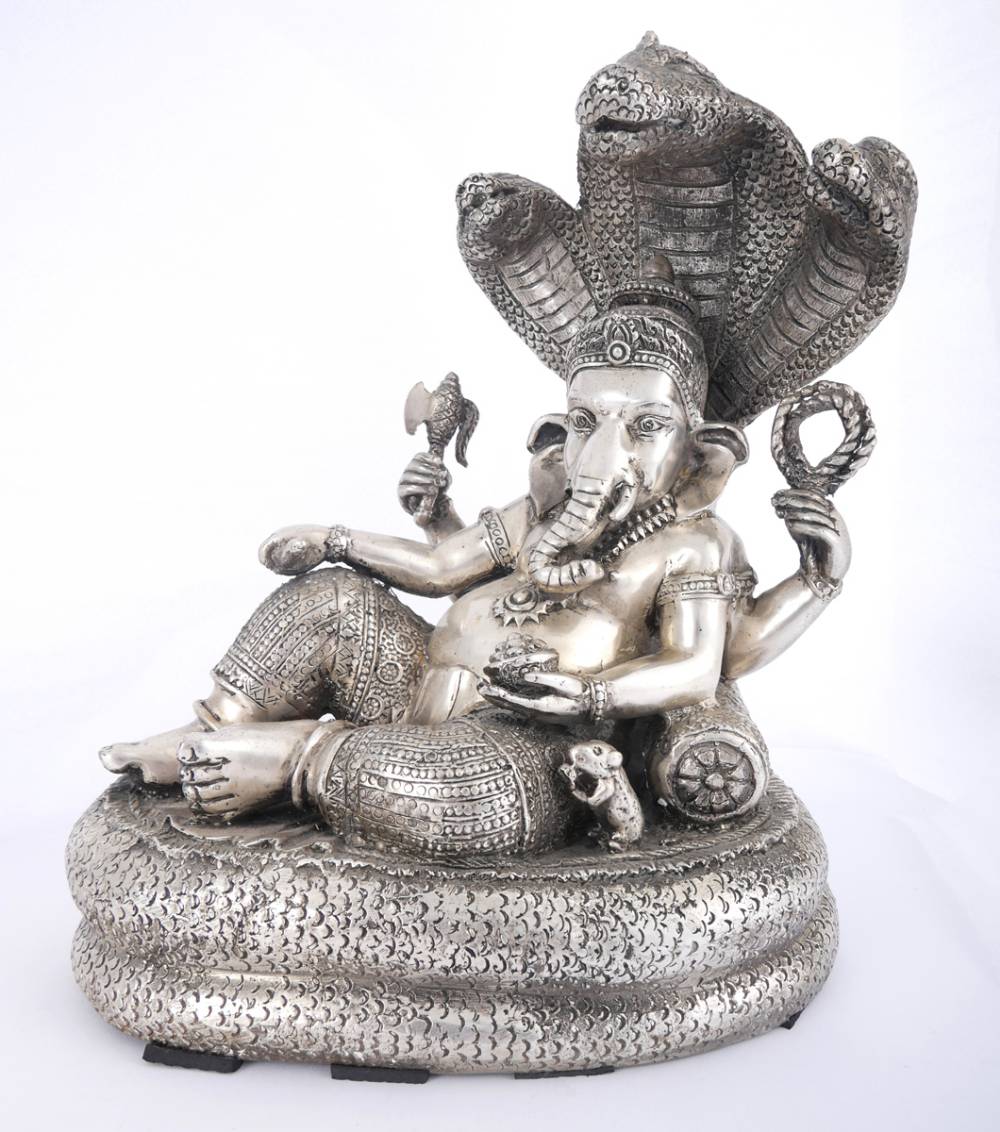 A white metal figure of Ganesha. at Whyte's Auctions