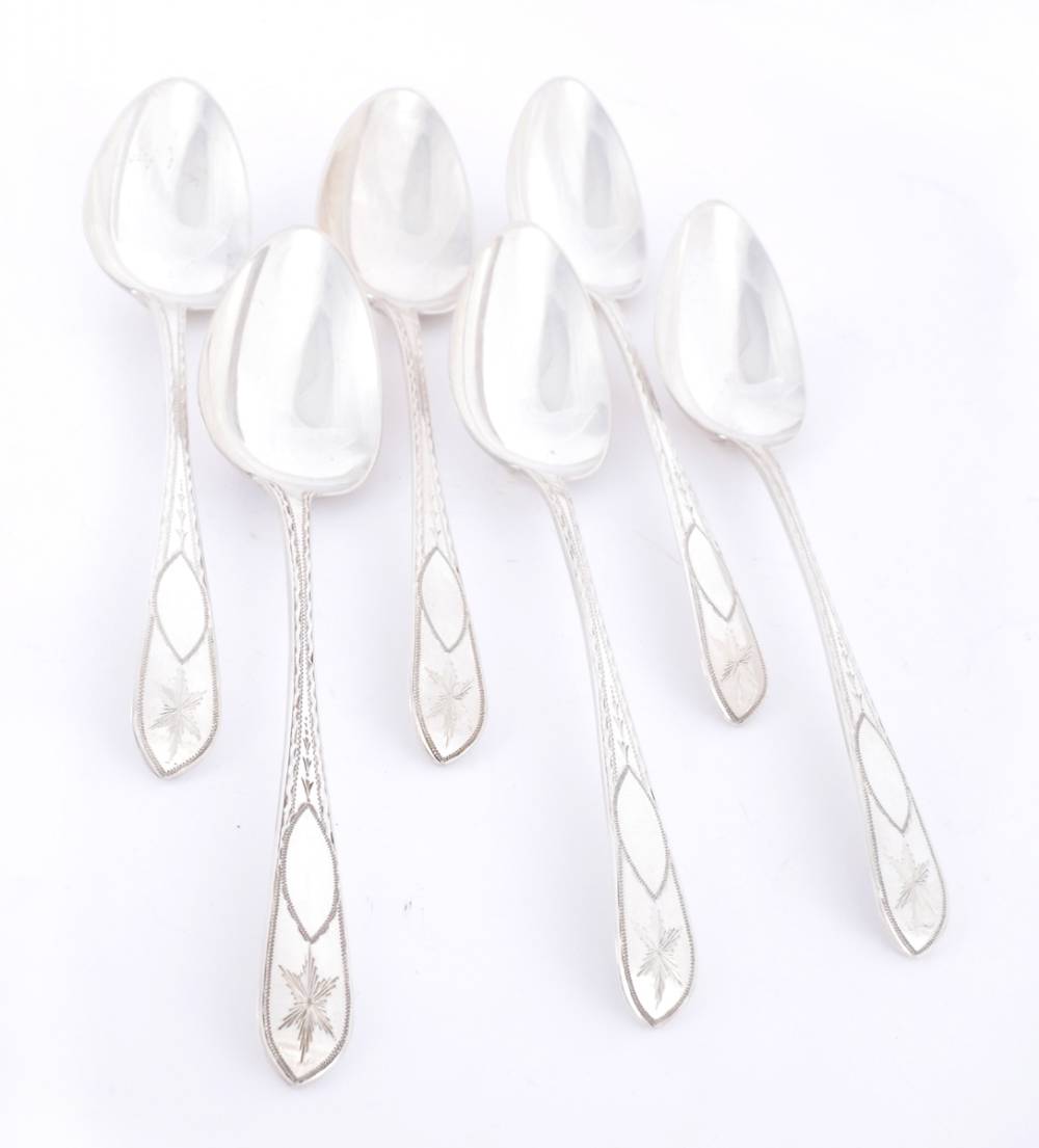 A set of six George IV Irish silver brightcut dessert spoons, by P. Moore. at Whyte's Auctions