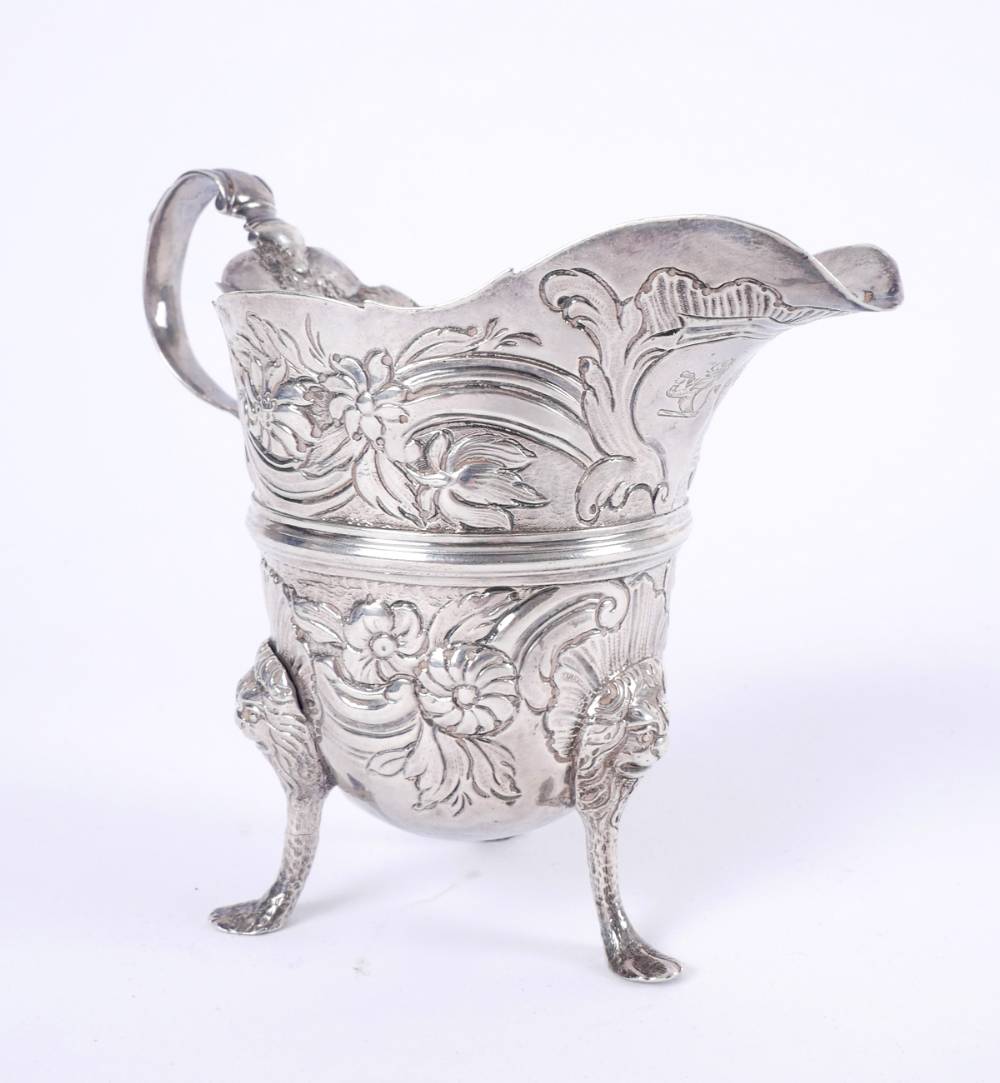 A George II Irish silver helmet-shaped cream jug, by John Moore, Dublin. at Whyte's Auctions