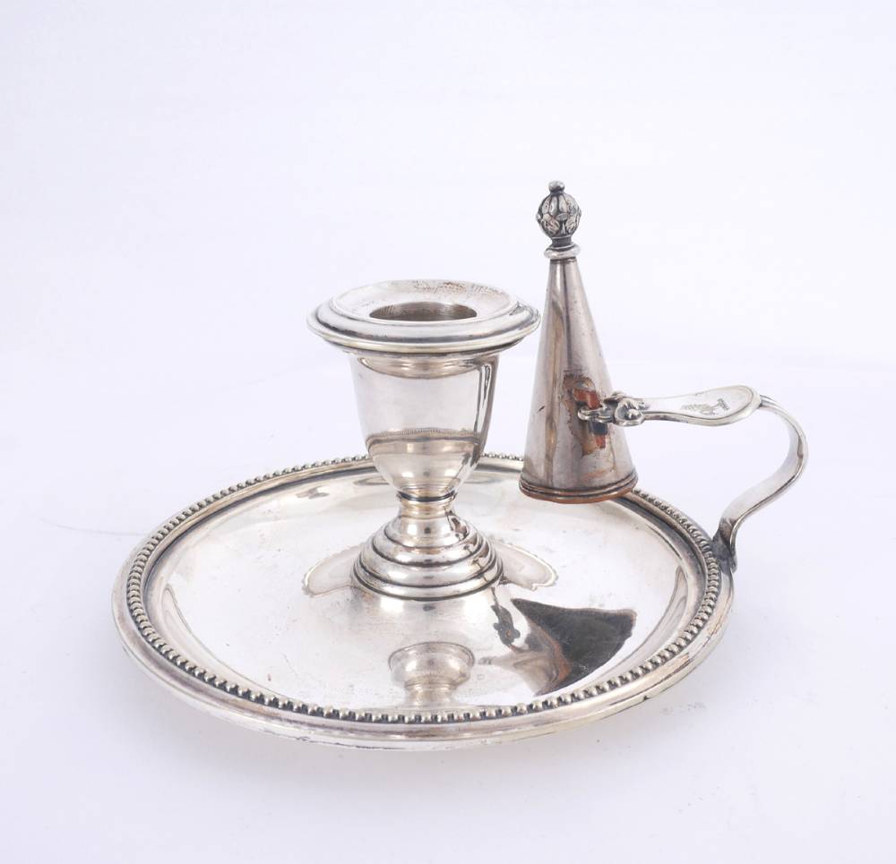 A Victorian silver plated chamber candlestick and snuffer. at Whyte's Auctions