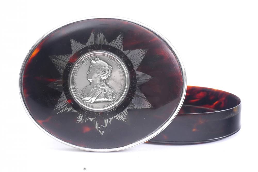 Queen Anne silver mounted tortoiseshell oval tobacco box. at Whyte's Auctions