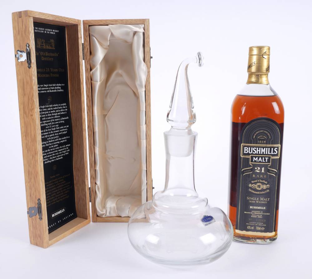 Bushmills Malt, 21 Year Old, Madeira Finish Irish Whiskey, one bottle and a Bushmills pot still decanter. at Whyte's Auctions