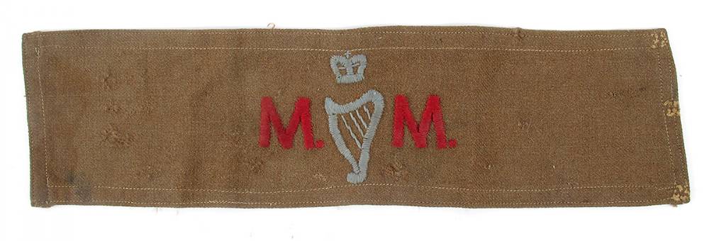 Early 20th century armband 'MM' with crowned harp. at Whyte's Auctions
