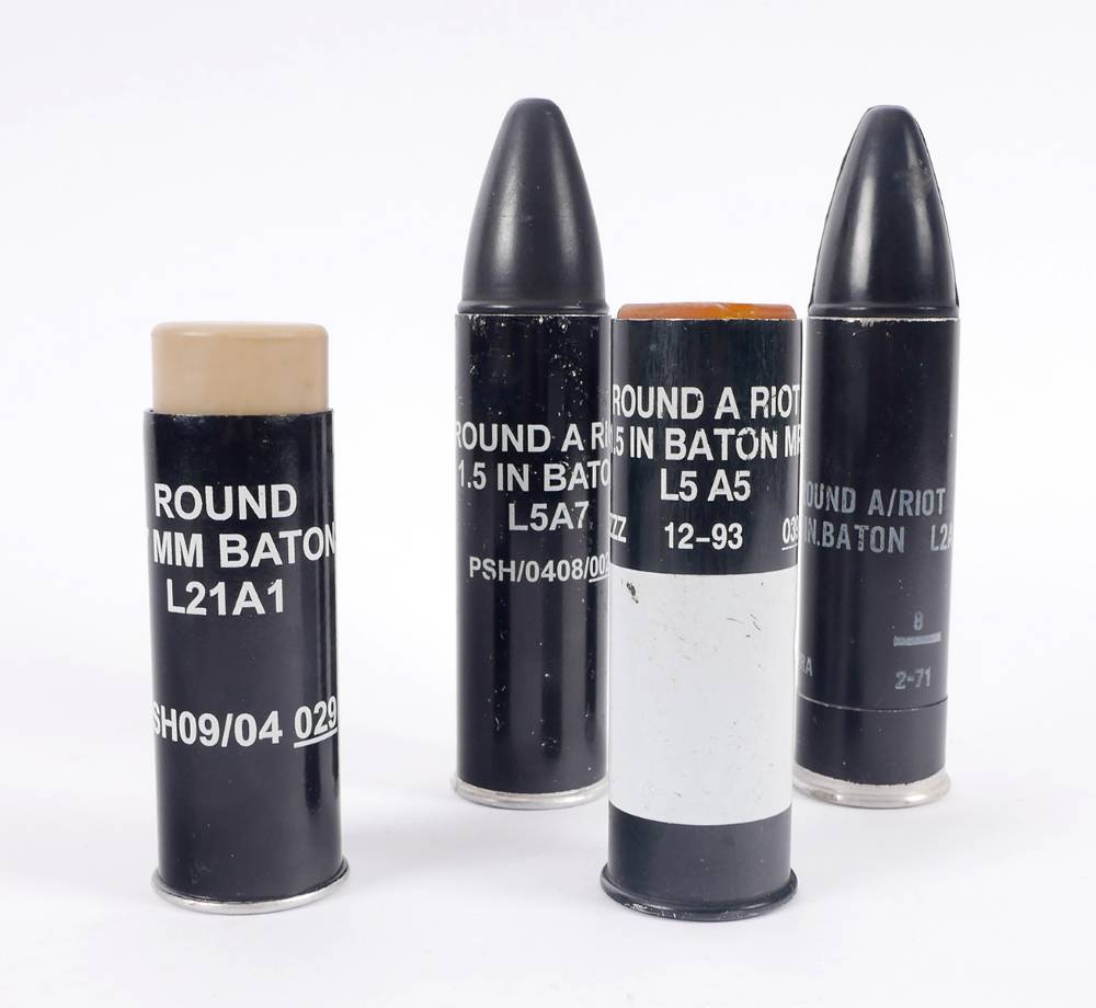 A collection of inert rubber bullets and plastic baton rounds. at Whyte's Auctions