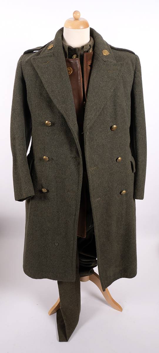 Irish Army uniforms including tunic, trousers, greatcoat and leather jerkin. (4 items) at Whyte's Auctions