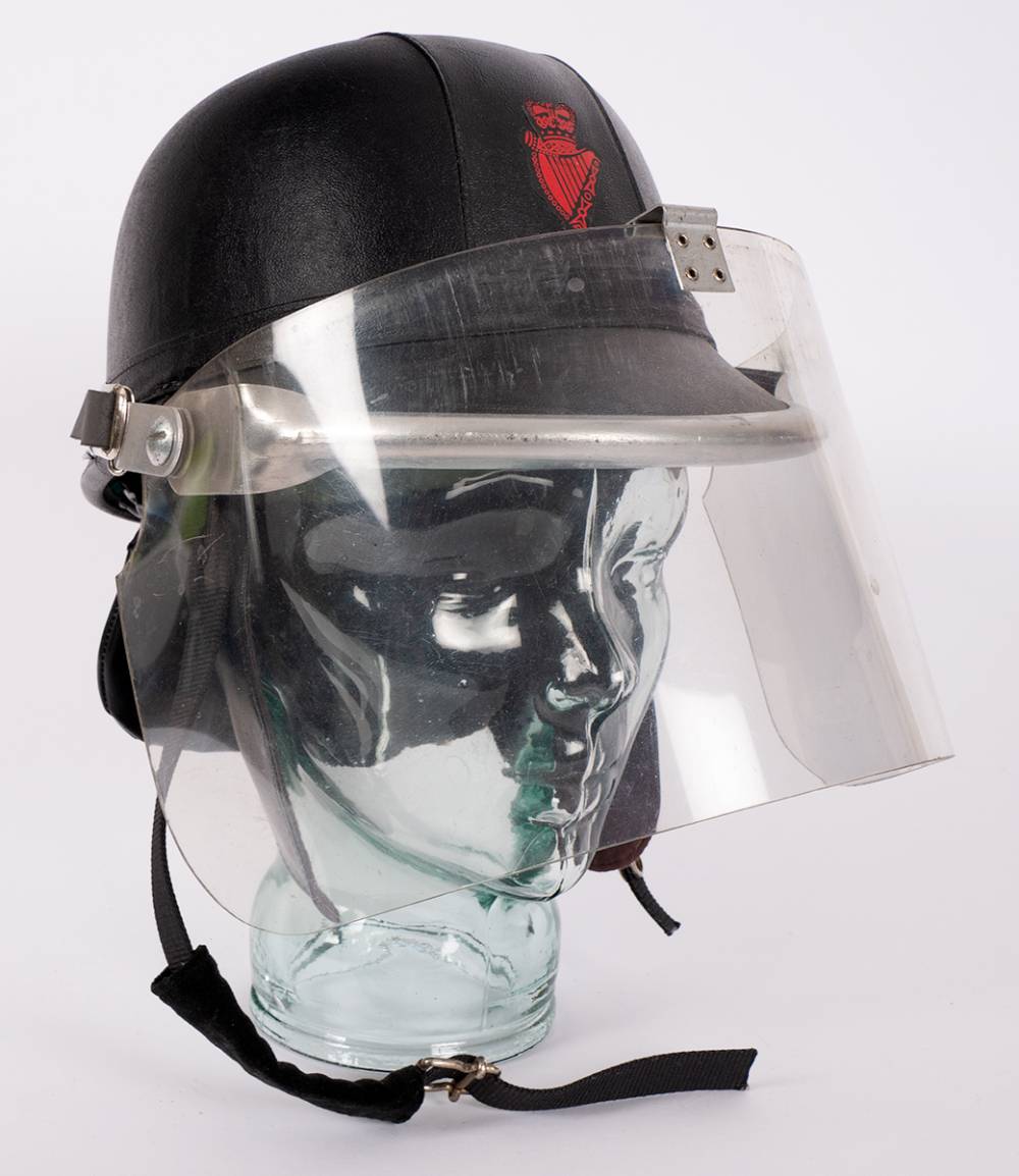 1969 pattern Royal Ulster Constabulary  'Skulgarde' helmet for use in riots. at Whyte's Auctions