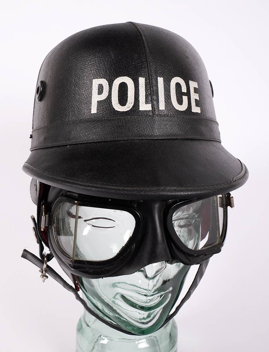 1950s to 1960s, 'The Corker' Police helmet, issued to the Royal Ulster Constabulary. at Whyte's Auctions