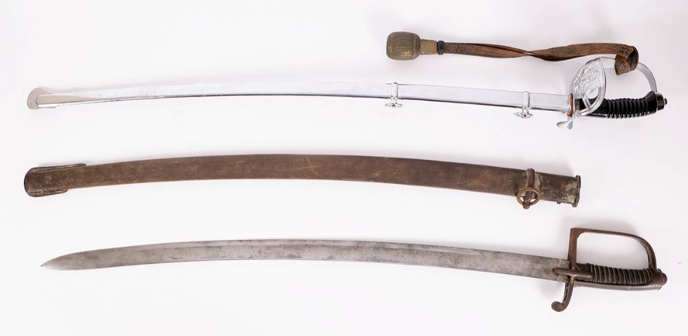 A 19th century French cavalry sword and a 20th century Eastern European sword. at Whyte's Auctions