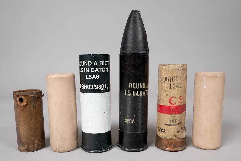 1970s to 1980s collection of rubber bullets, CS canisters and baton rounds used in Northern Ireland (6) at Whyte's Auctions