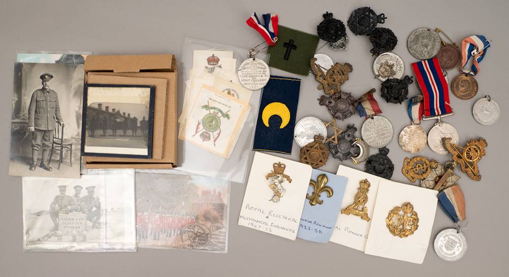 1900- 1950 militaria and royalty collection including postcards, badges, medals, cigarette cards, and photographs. at Whyte's Auctions