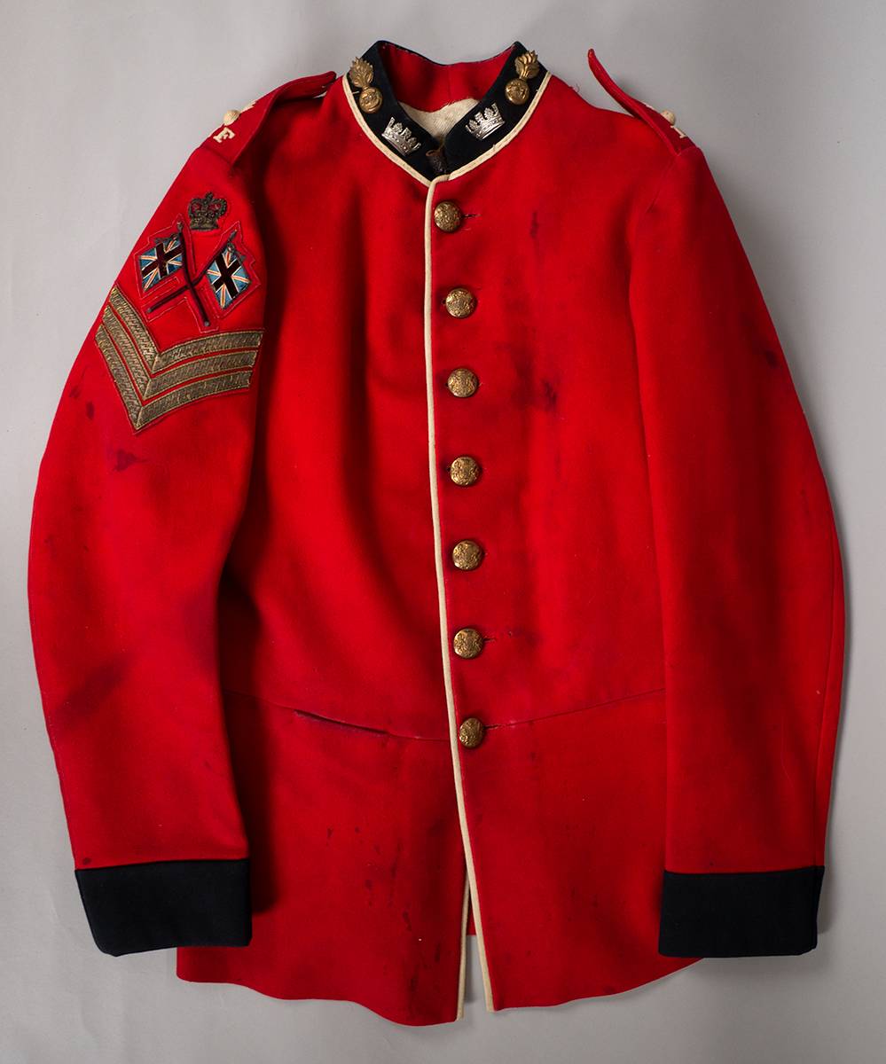 Circa 1900 Royal Irish Fusiliers Recruiting Sergeant's red tunic and large grenade busby badge at Whyte's Auctions