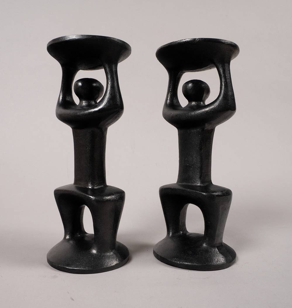 CANDLEHOLDER IN THE FORM OF A FIGURE (A PAIR) by Ois�n Kelly RHA (1915-1981) at Whyte's Auctions