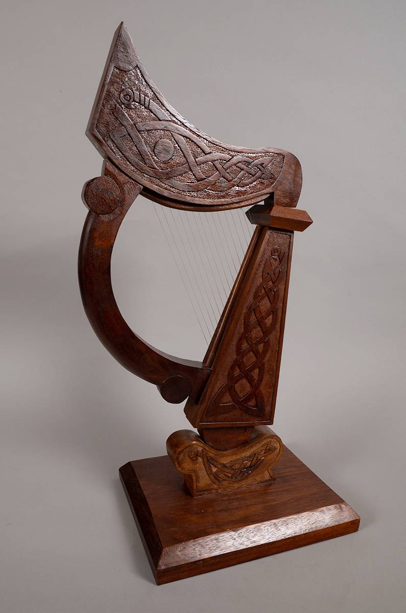 Circa 1980. Long Kesh Internment Camp: prisoner art. A hand carved harp, signed D. Loy. at Whyte's Auctions