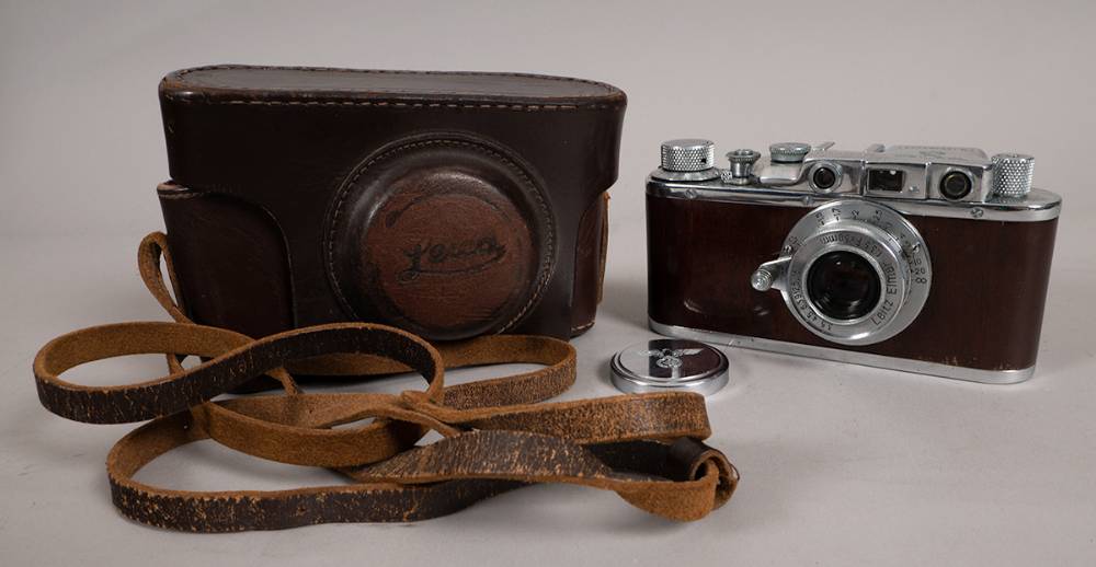 Circa 1940-1960  a 'Leica Bildebericter' camera Soviet Union reproduction bearing German military markings. at Whyte's Auctions