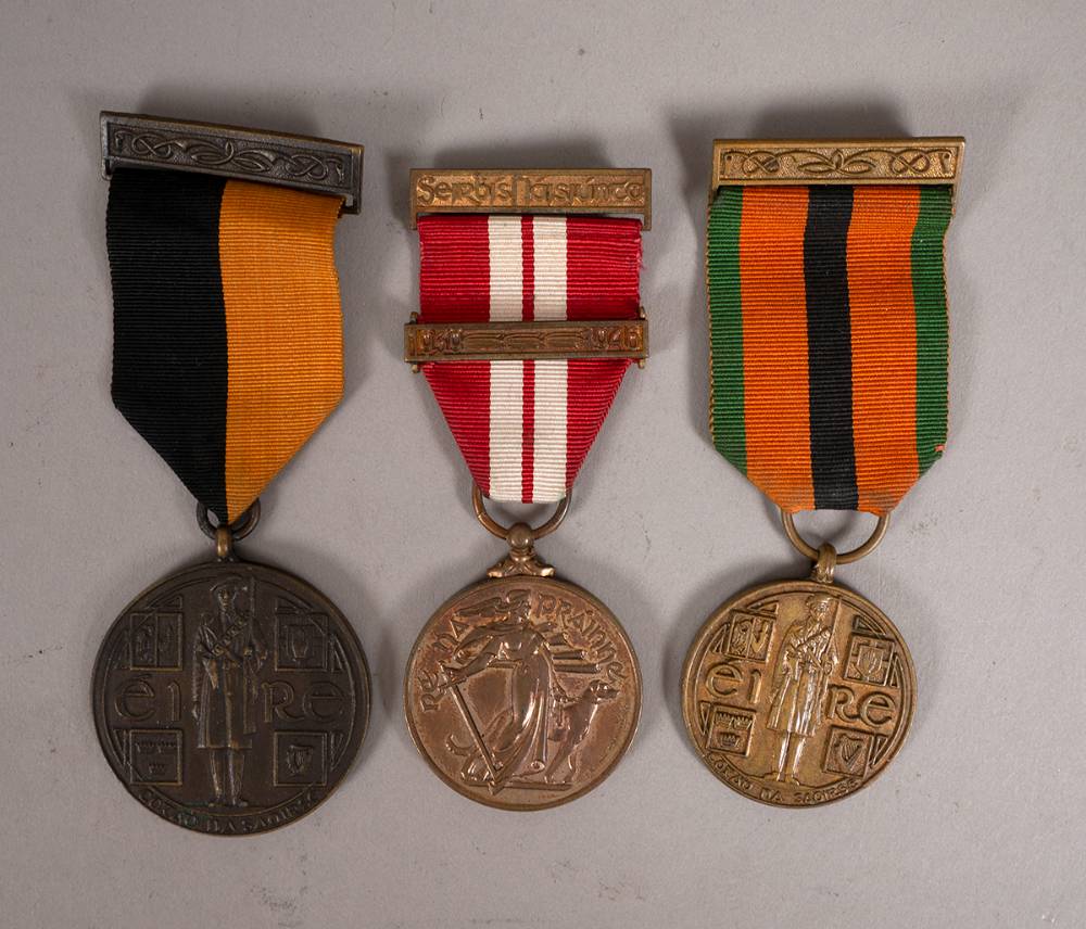 1917-21 War of Independence Service Medal, 1939-1946 Emergency Service Medal 26th Battalion issue and 1971 Truce Anniversary Medal. at Whyte's Auctions