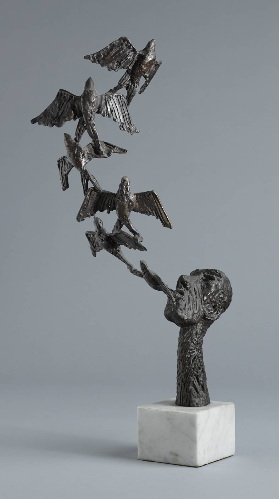 HEAD AND FLIGHT OF BIRDS, 1977 by John Behan sold for �4,800 at Whyte's Auctions