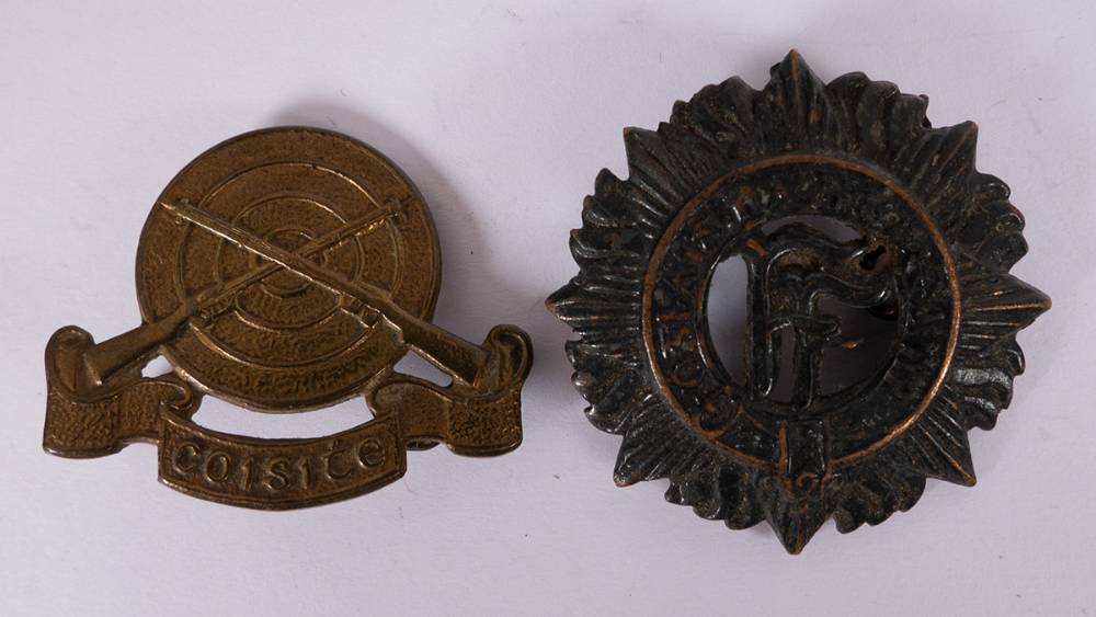 1914-22 Irish Volunteer cap badge and Irish Free State infantry cap badge at Whyte's Auctions