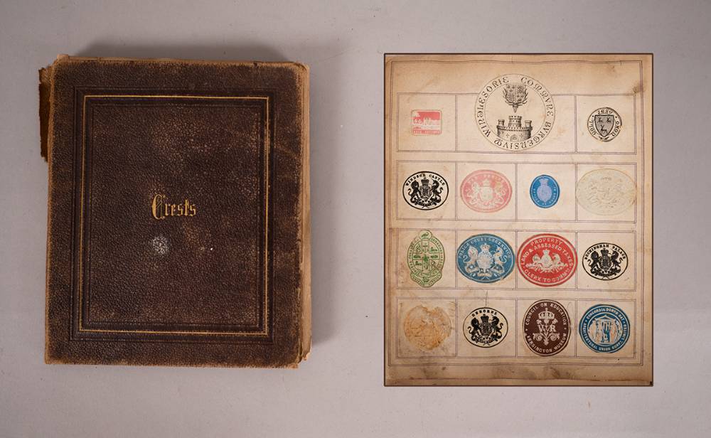 Late 19th century collection of embossed coloured crests cut out from stationery (2200 approx.) at Whyte's Auctions