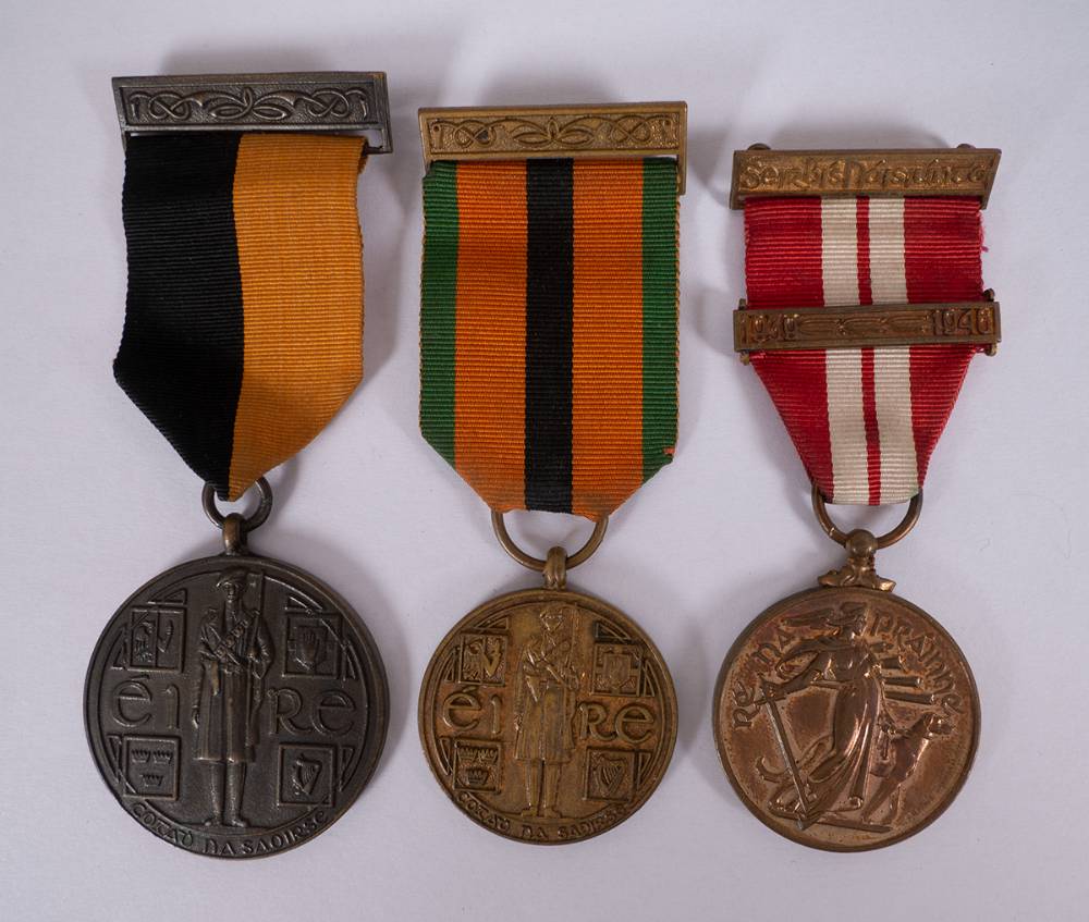 1917-1921 War of Independence Service Medal, 1939-1946 Emergency Service Medal 26th Battalion issue and 1971 Truce Anniversary Medal. at Whyte's Auctions